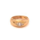 A baguette and trillion diamond three-stone gypsy ring in 18ct gold, featuring a centre vertical