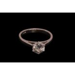 A diamond solitaire ring in platinum, composed of a brilliant diamond with an estimated weight of