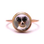 An Essex crystal ring depicting a Jack Russell Terrier, the reverse intaglio is done on a round rock