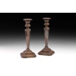 A pair of early 20th century octagonal section table candlesticks, Sheffield 1920 by James Dixon &