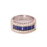 A three-row sapphire and diamond dress ring, set with a central tramline of baguette-cut synthetic
