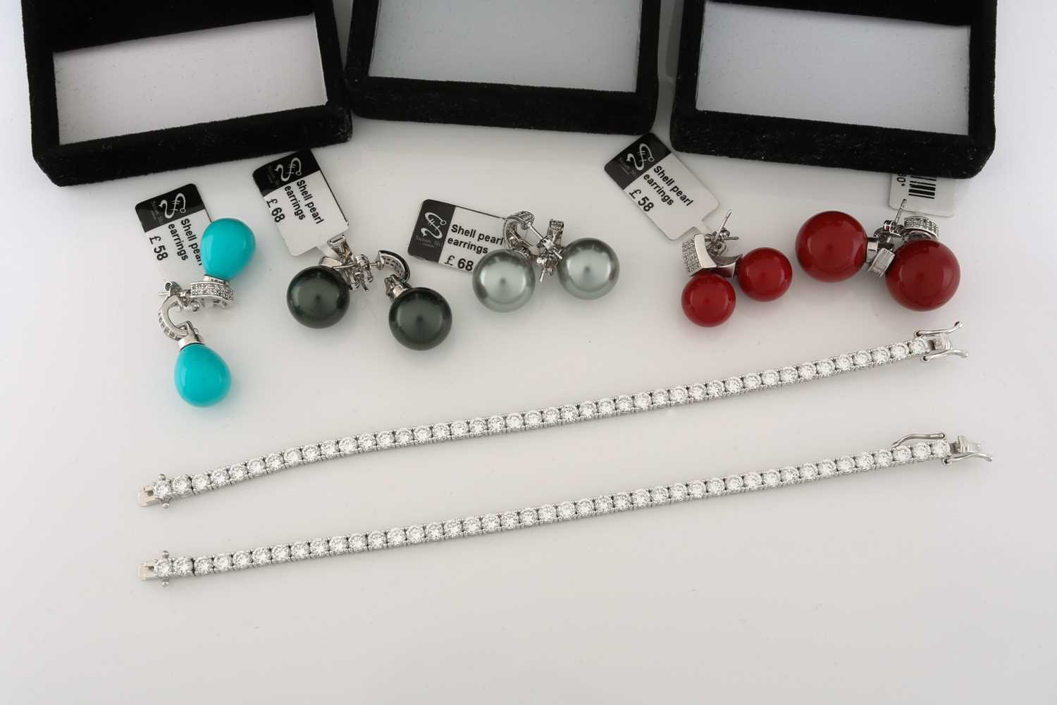 A lot consisting of 8 pairs of imitation enamel pearls and two cubic Zirconia line bracelets. The - Image 3 of 3