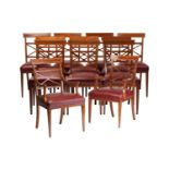 A set of twelve Edwardian mahogany Sheraton revival dining chairs including ten singles and two