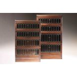 A pair of Globe Wernicke four-section modular stacking oak bookcases each bookcase with leaded