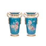 A pair of Paris porcelain baluster vases, 19th/ 20th century, each with flared and shaped rims and a