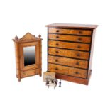 An Aesthetic Movement period faux bamboo and pine miniature mirror door wardrobe with apse and