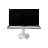 A Bang & Olufsen Beovision 7 55 (55") flat panel, led television and stand with integral blu-ray and