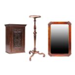 A Queen Anne style walnut torchere stand with dish top inverted trumpet column and Vitruvian