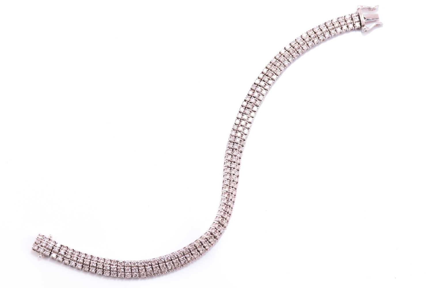 A three-row diamond tennis bracelet, featuring arrays of brilliant diamond with an estimated total - Image 5 of 9