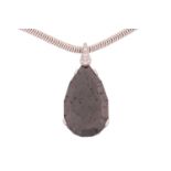 An estimated 33.00ct black diamond pendant on chain, featuring a large pear-shaped faceted carbonado