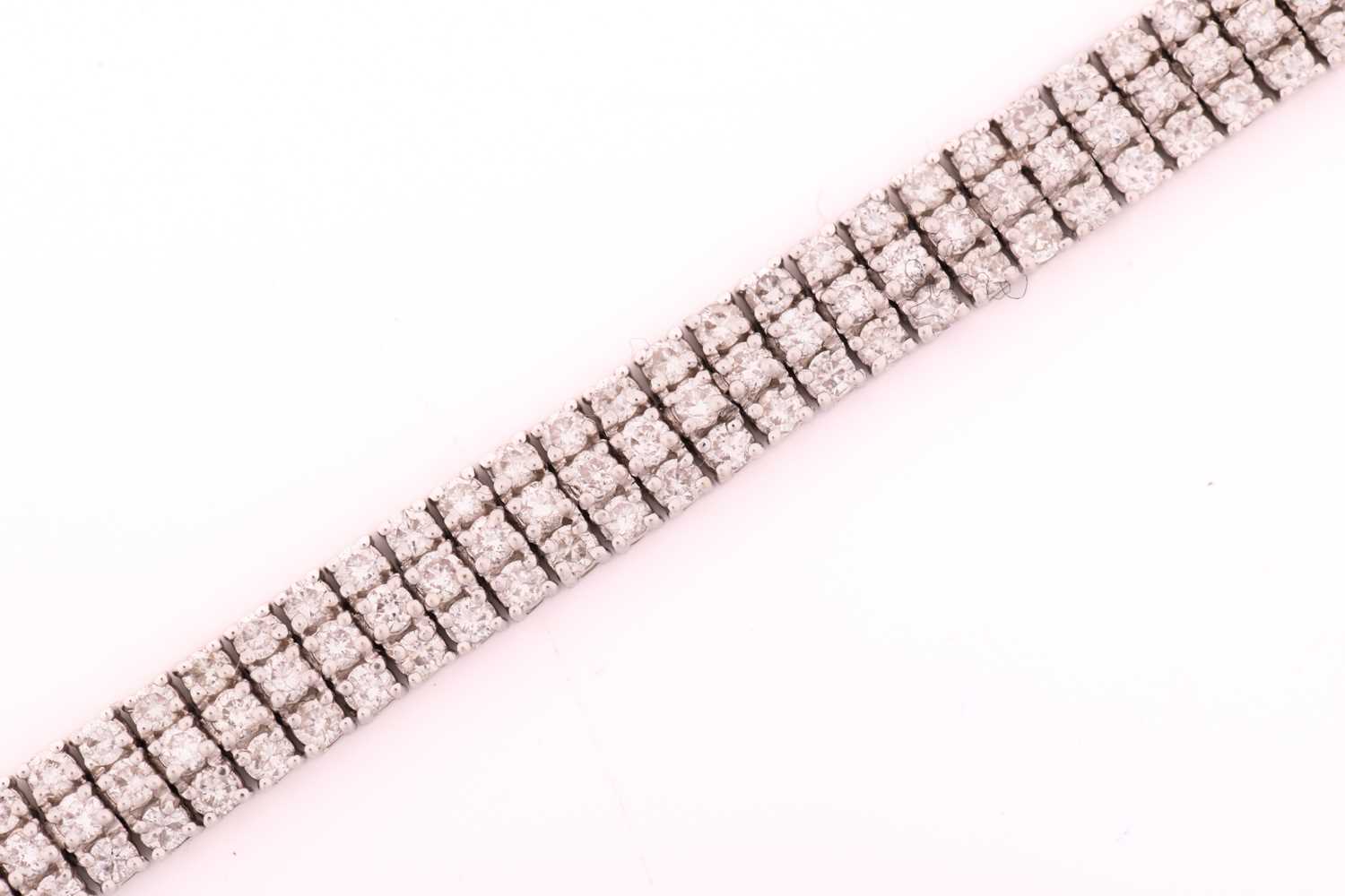 A three-row diamond tennis bracelet, featuring arrays of brilliant diamond with an estimated total - Image 7 of 9