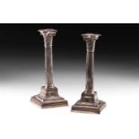A pair of Edwardian loaded silver Corinthian column table candlesticks. Sheffield 1909 by James