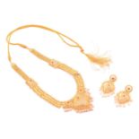 A yellow metal, ruby and fresh water pearl bridal set; comprising a fringe necklace and a pair of