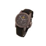 A Girard-Perregaux Asprey-Ferrari titanium automatic chronograph wristwatch, featuring a 57-jewel