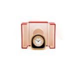 A Les Must De Cartier Travel clock and matching Cartier picture frame, with a manual wind movement