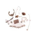 An assemble of white metal jewellery; to include examples of a mother of pearl bracelet, with