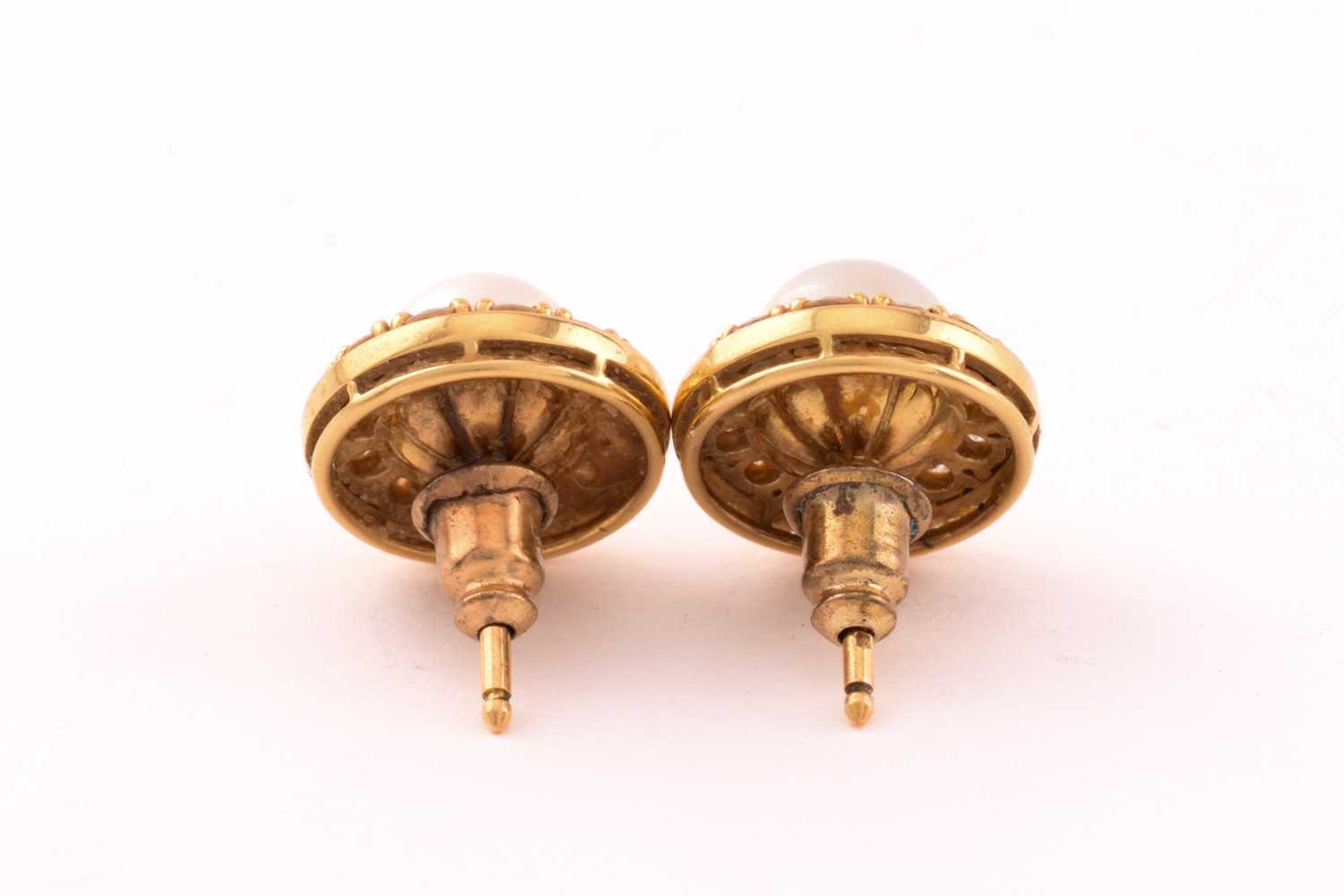 A pair of pearl and diamond earrings in 18ct gold, each consisting of a 7.0 mm round pearl, set - Image 3 of 6