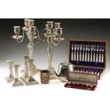 A pair of Edwardian Neo-Classical four-sconce silver plated candelabra with removable upper sections