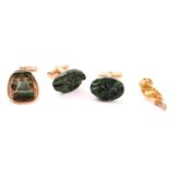 A yellow metal nugget pendant, a pair of African carved fuchsite cufflinks with a matching