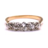 A five-stone diamond half hoop ring, comprises five old-cut diamonds graduating from the centre,