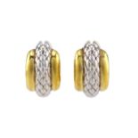 FOPE - a pair of two-toned creole earrings, each featuring a hollow hoop with a textured section