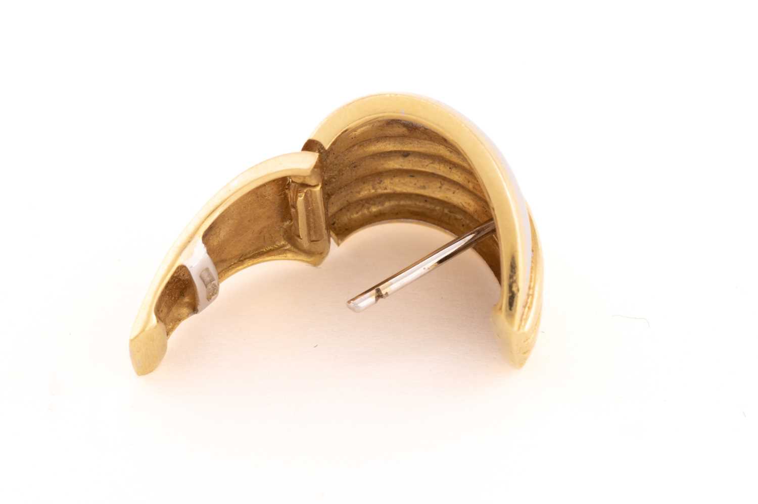 A pair of two-toned clip post earrings, each composed of a curved panel with fluted details, - Image 4 of 6