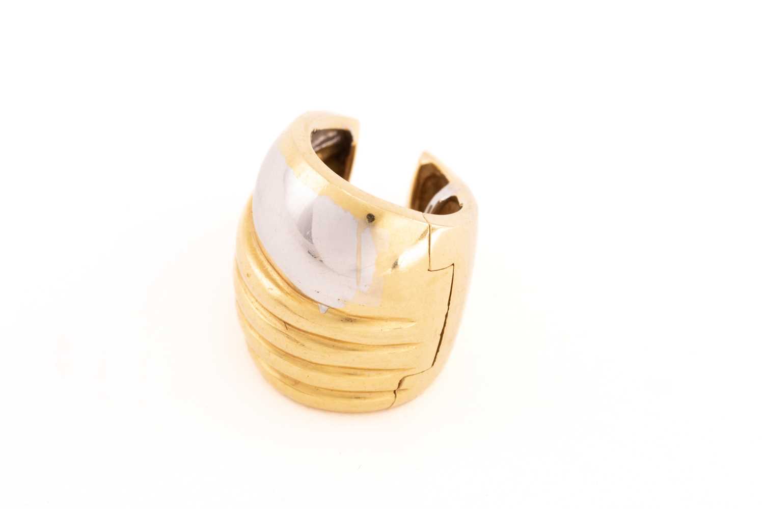 A pair of two-toned clip post earrings, each composed of a curved panel with fluted details, - Image 3 of 6