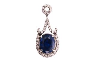 A sapphire and diamond pendant, consisting of an oval sapphire with deep blue body colour and