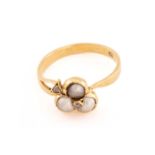 A pearl and diamond three-leaf clover ring, three split pearls assembled as a trefoil motif,