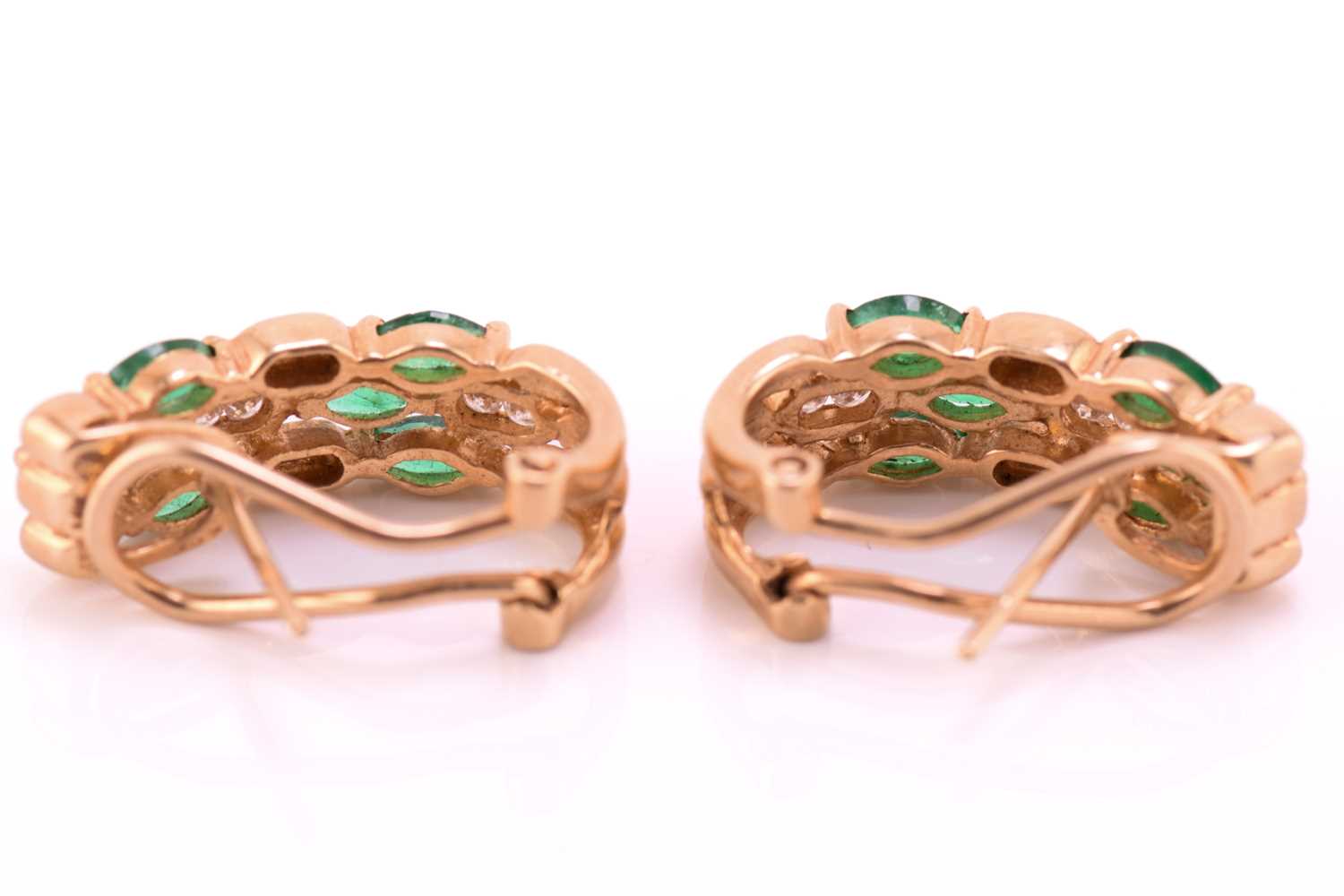 A pair of emerald and diamond earrings, each comprises six marquise-shaped emeralds and four - Image 4 of 5