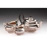An Edwardian three-piece silver tea set in Queen Anne style, by Richard Martin & Ebenezer Hall (