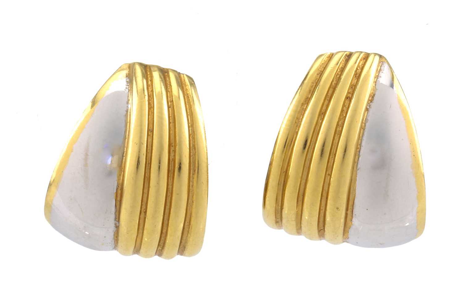 A pair of two-toned clip post earrings, each composed of a curved panel with fluted details,