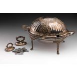 An early 20th-century epns roll over breakfast bacon dish with floral and fluted dome body. On lions