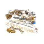 A collection of miscellaneous costume jewellery items mainly in base metal; to include a silver