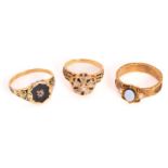 Three 19th-century mourning rings; including a signet ring with a hexagonal onyx ring face with an