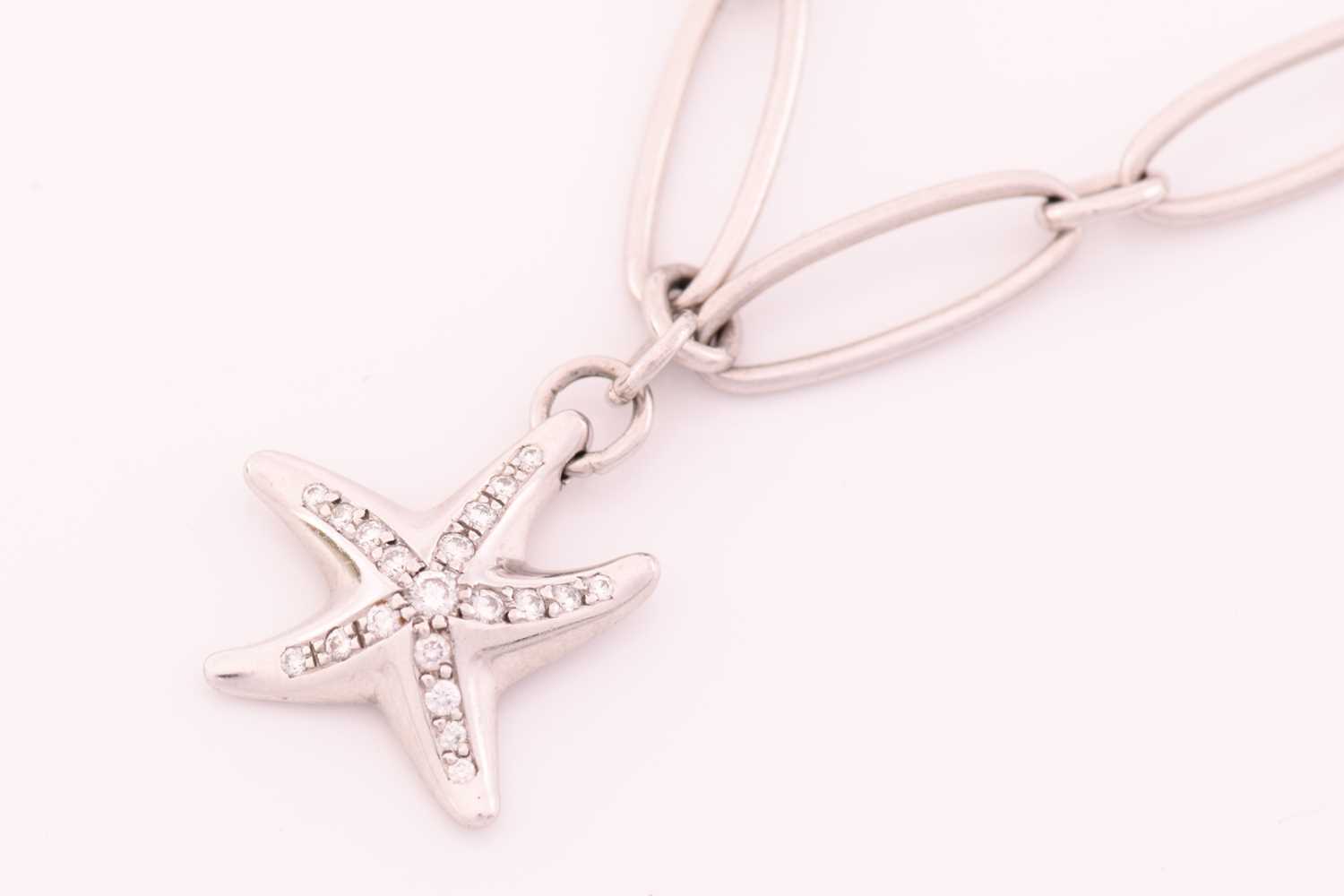 Tiffany & Co. - A platinum charm bracelet with diamonds, comprises a figural starfish charm, - Image 3 of 5