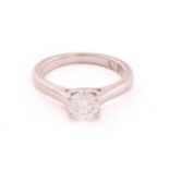 A platinum and diamond solitaire ring, featuring a brilliant-cut diamond with an estimated weight of