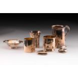 A collection of silver comprising of an Asprey & Co. Ltd tankard of tapering cylindrical form with