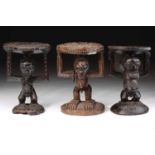 Three Songye caryatid stools, Democratic Republic of Congo, carved as two standing females and a