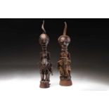 Two Songye community power figures, Mankisi, Democratic Republic of Congo, each with horn charge,