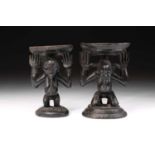 Two Luba female caryatid stools, Democratic Republic of Congo, carved standing and kneeling, with
