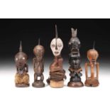 A group of five songye power figures, Nikisi, Democratic Republic of Congo, including a half figure,