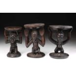 A Luba double caryatid stool, Democratic Republic of Congo, carved as a male and female supporting a