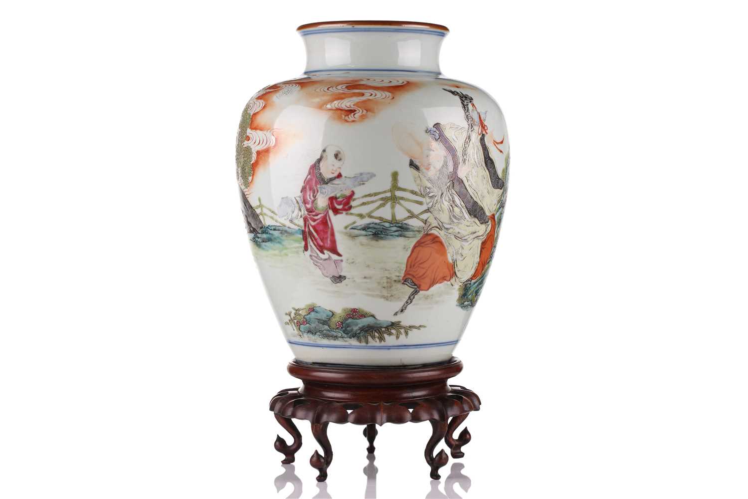 A Chinese porcelain vase, late Qing dynasty, painted with Shoulao and a boy attendant within a