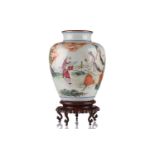 A Chinese porcelain vase, late Qing dynasty, painted with Shoulao and a boy attendant within a