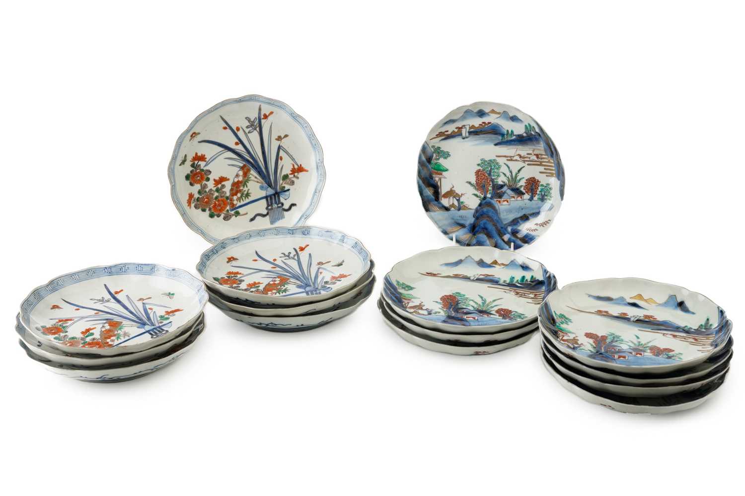 A set of seven Japanese Arita plates, late 19th century, painted with flowers and leaves with