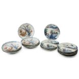 A set of seven Japanese Arita plates, late 19th century, painted with flowers and leaves with