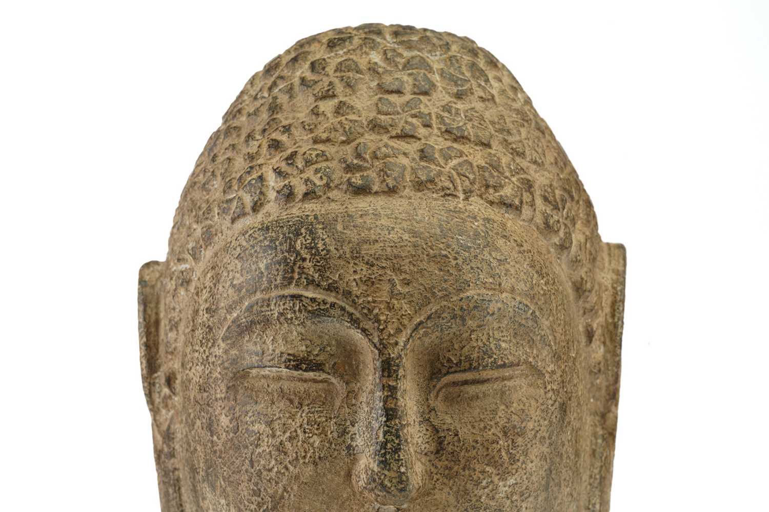 A Chinese-carved stone head of the Gautama Buddha with "snail shell" curls elongated ear lobes and - Image 2 of 4