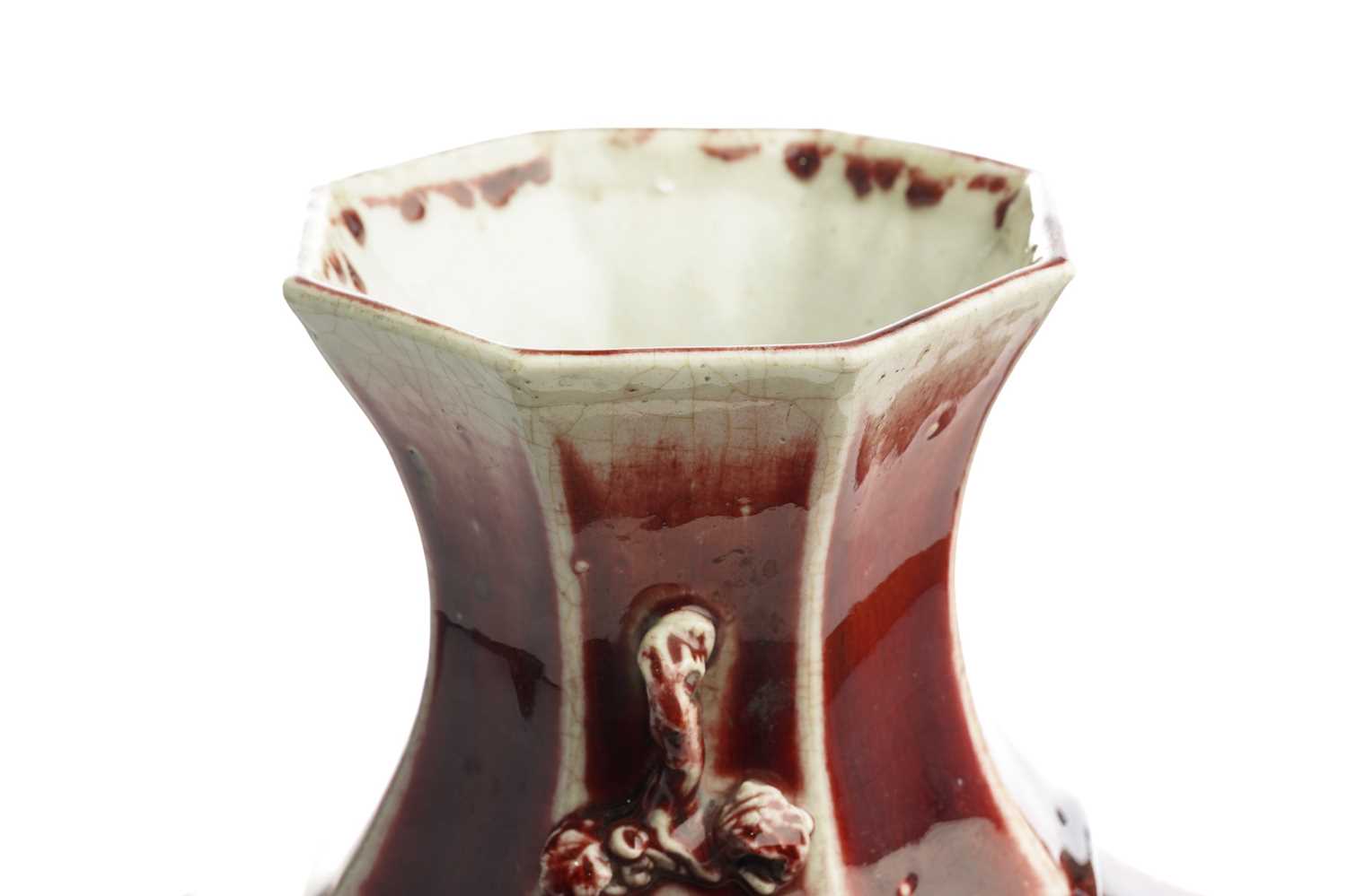 A large Chinese Sang de Boeuf octagonal vase, Qing, 18th/19th century, the waisted neck with applied - Image 4 of 5