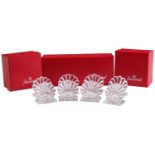 Eight Baccarat crystal glass shell-shape place settings, in three branded boxes, 5.5 cm high x 5.5